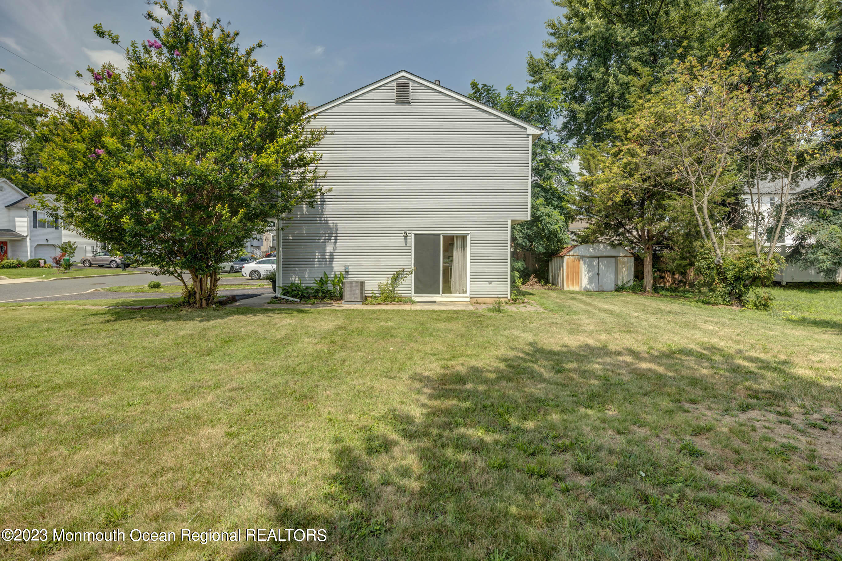 244 Raritan Street Keyport, NJ 07735 - Photo 18 of 20 a front view of house with yard and trees