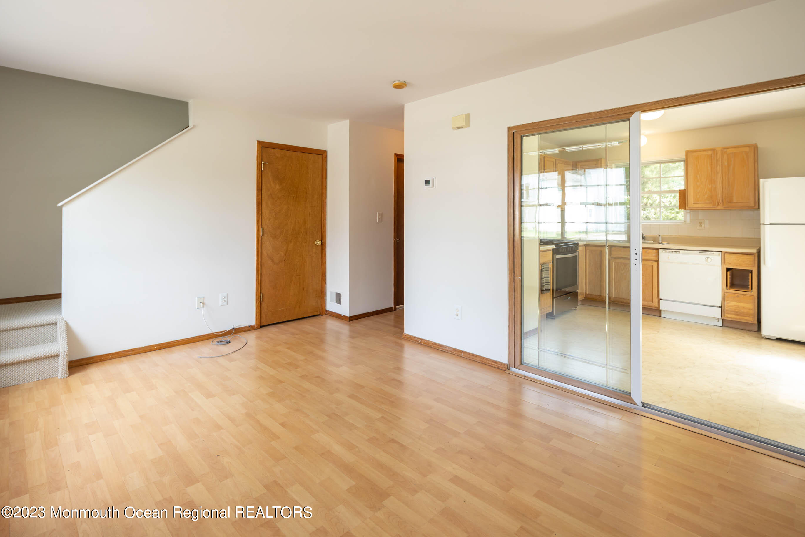 244 Raritan Street Keyport, NJ 07735 - Photo 4 of 20 a view of an empty room with glass door