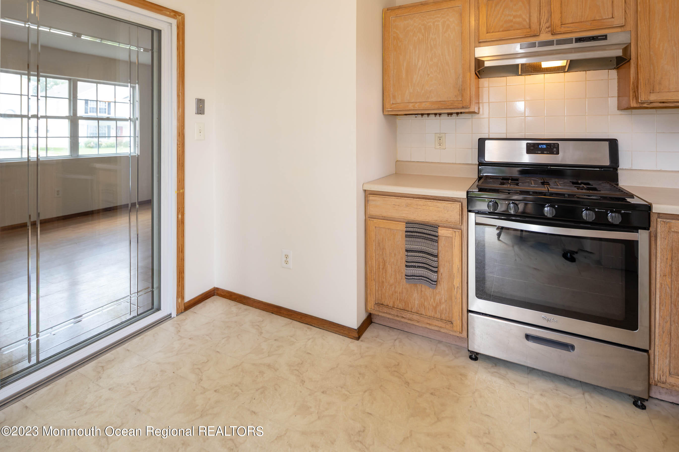 244 Raritan Street Keyport, NJ 07735 - Photo 10 of 20 a kitchen with a stove and a cabinet