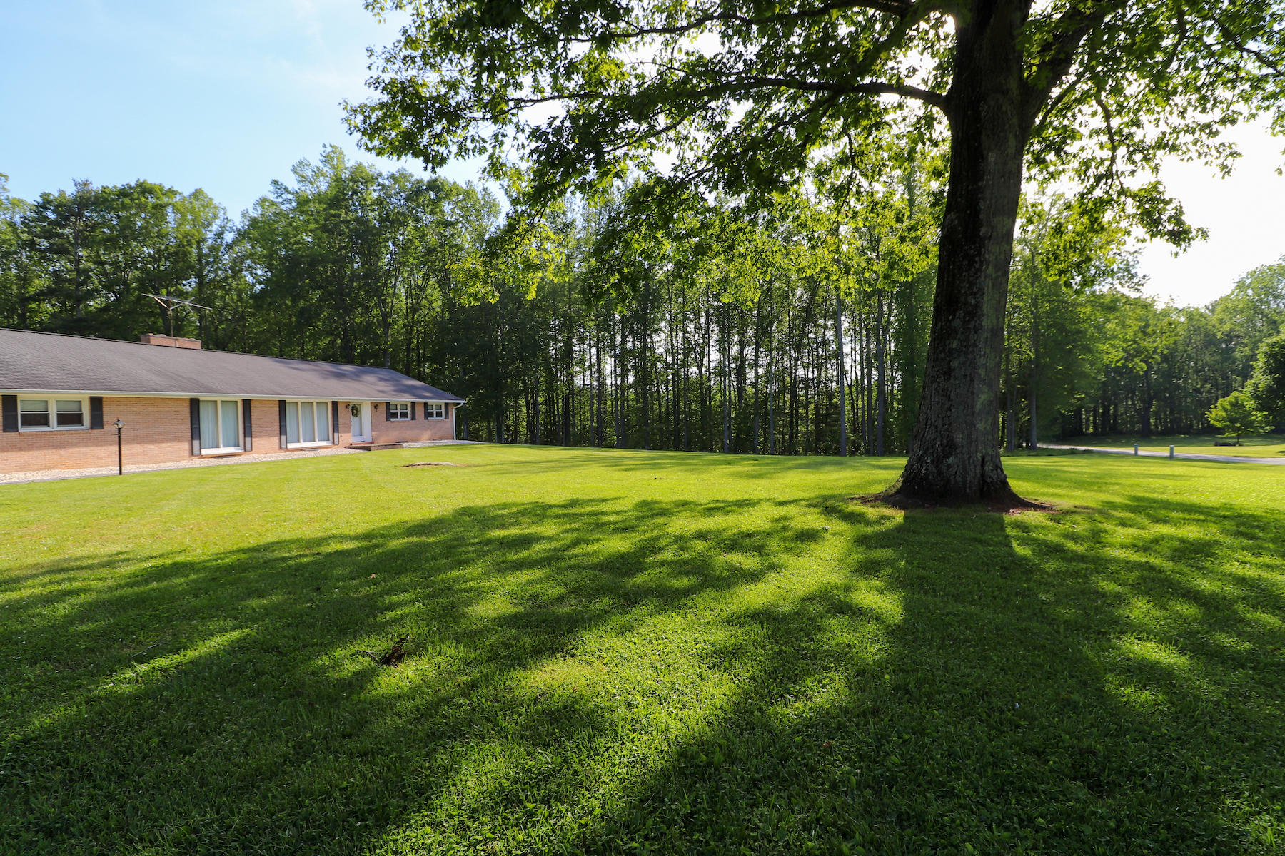 296 Kyle Weeks Road Southwest Willis, VA 24380 - Photo 2 of 35 a view of house with a big yard
