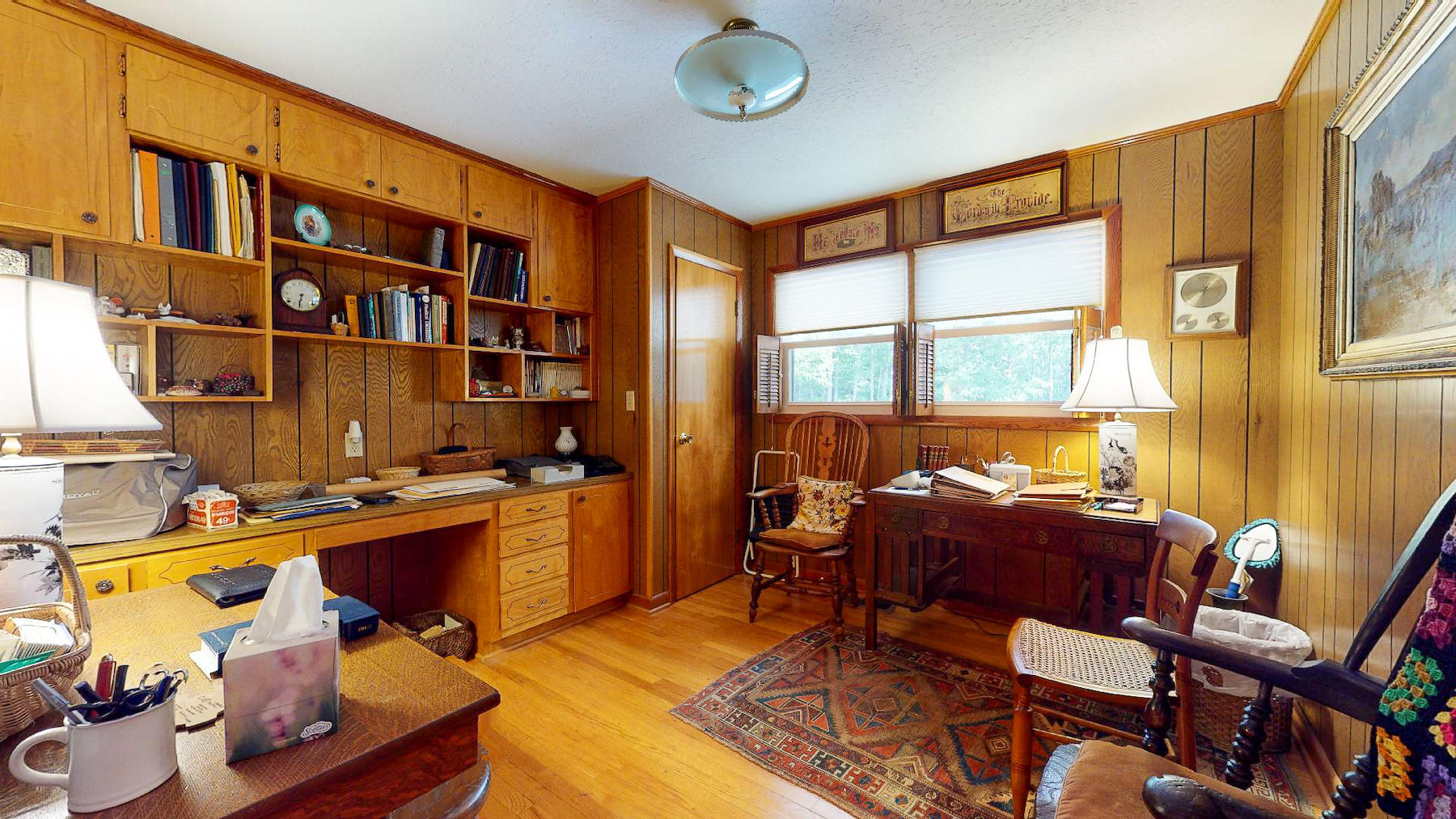 296 Kyle Weeks Road Southwest Willis, VA 24380 - Photo 11 of 35 a living room with furniture a bookshelf and a window