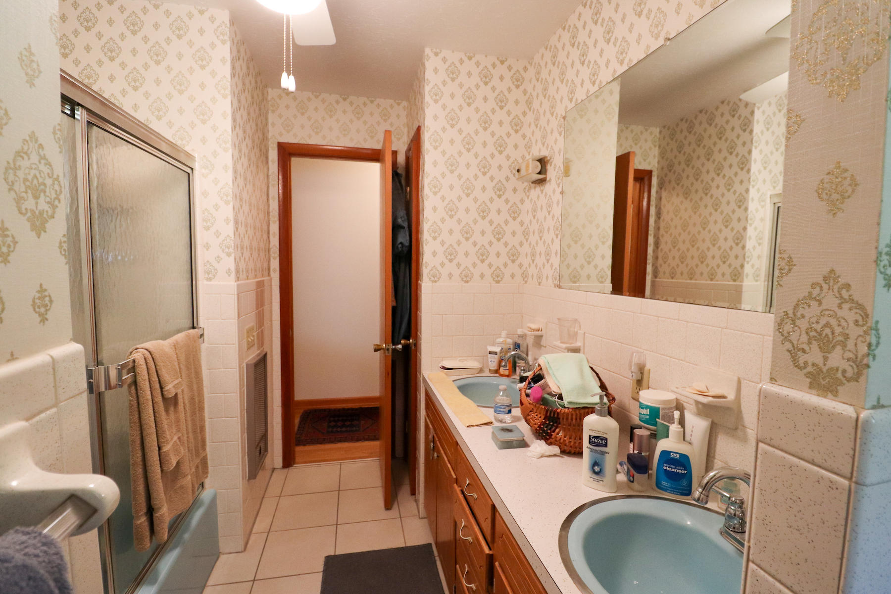 296 Kyle Weeks Road Southwest Willis, VA 24380 - Photo 12 of 35 a bathroom with a sink and a mirror