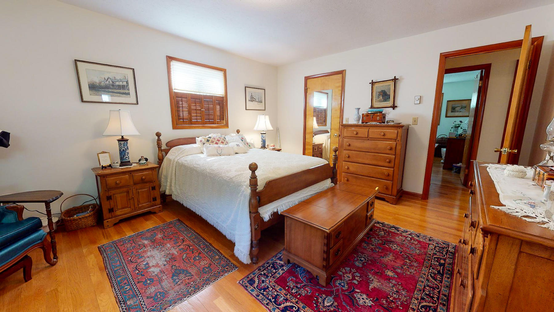 296 Kyle Weeks Road Southwest Willis, VA 24380 - Photo 13 of 35 a bedroom with a bed and wooden floor