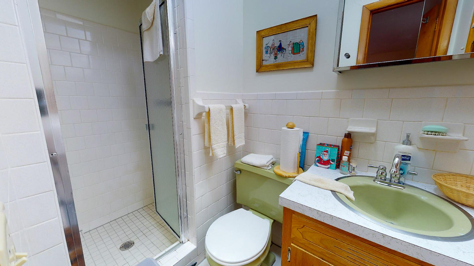 296 Kyle Weeks Road Southwest Willis, VA 24380 - Photo 15 of 35 a bathroom with a sink toilet and mirror