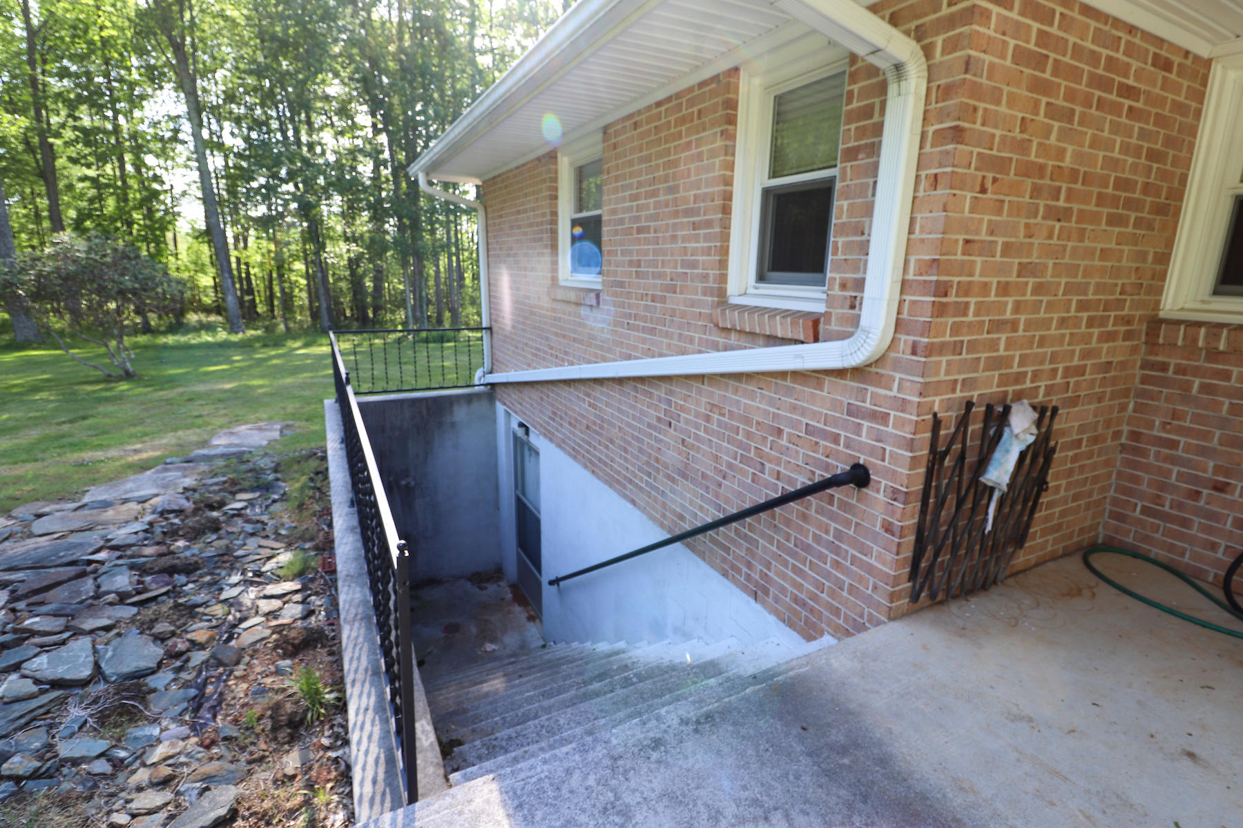 296 Kyle Weeks Road Southwest Willis, VA 24380 - Photo 24 of 35 a view of backyard with outdoor seating and trees