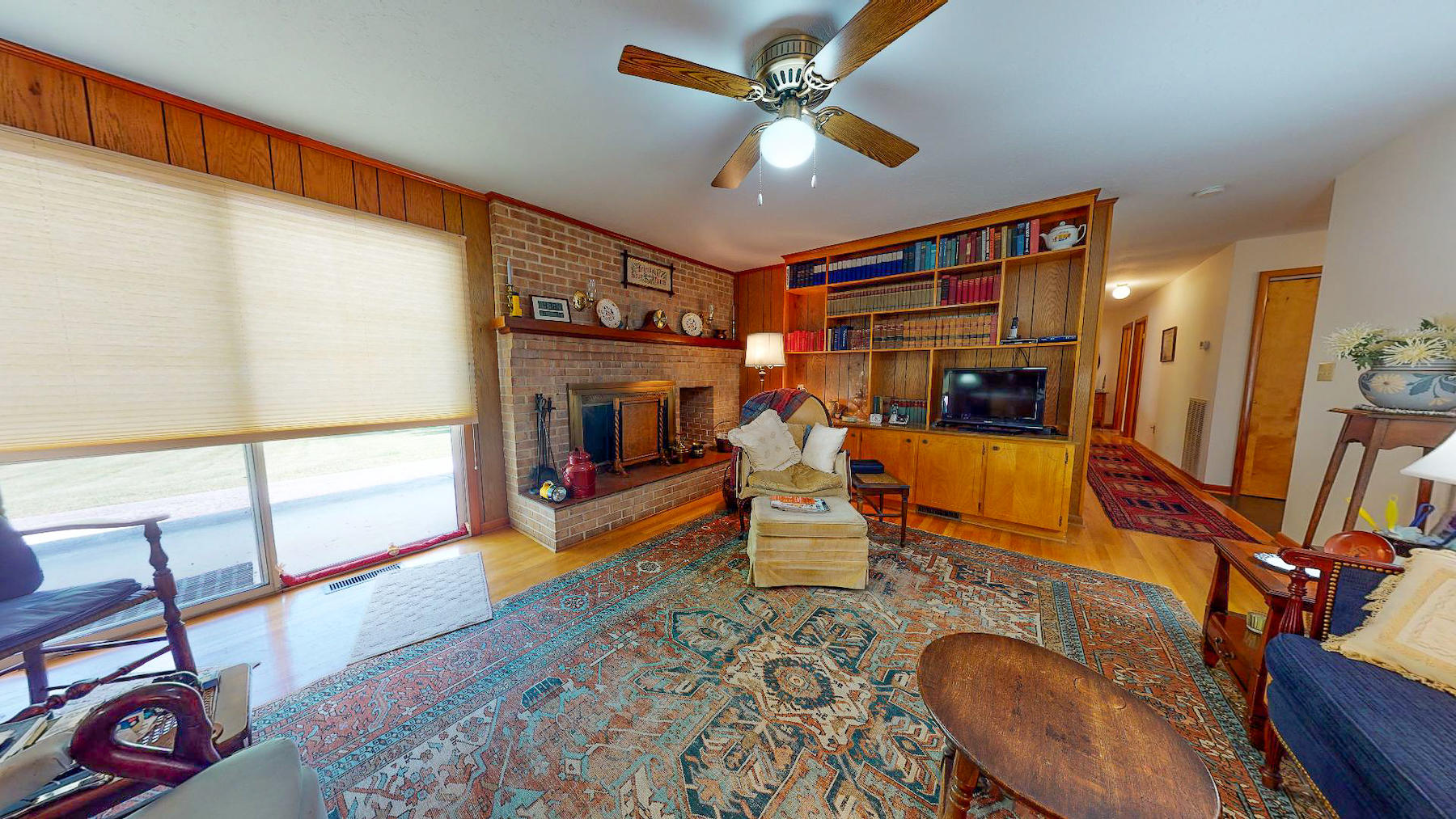 296 Kyle Weeks Road Southwest Willis, VA 24380 - Photo 9 of 35 a living room with furniture a rug and a flat screen tv