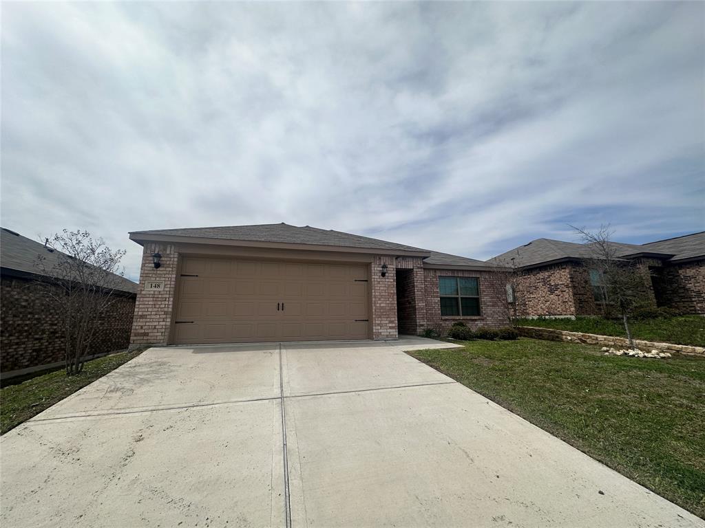 148 Holster Hollow Road Newark, TX 76071 - Photo 1 of 1 a house view with a garden space