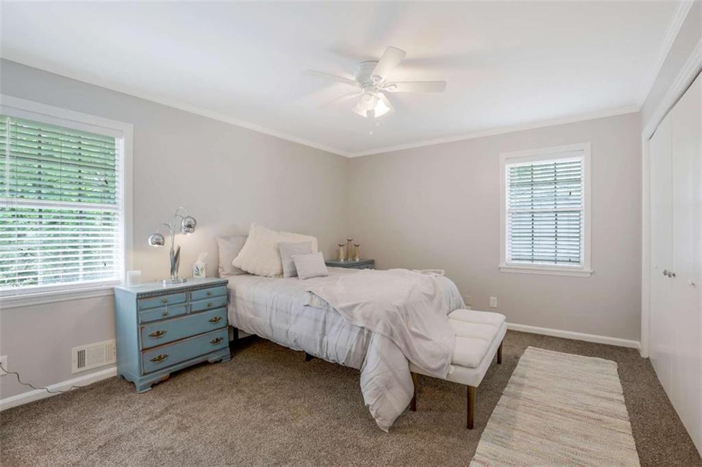 3211 Flamingo Drive East Point, GA 30344 - Photo 14 of 24 a bed room with a bed and a window