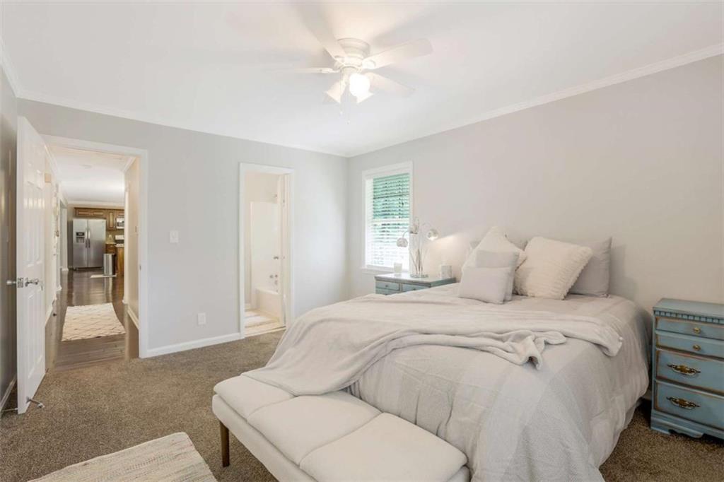 3211 Flamingo Drive East Point, GA 30344 - Photo 16 of 24 a large white bed in a white room