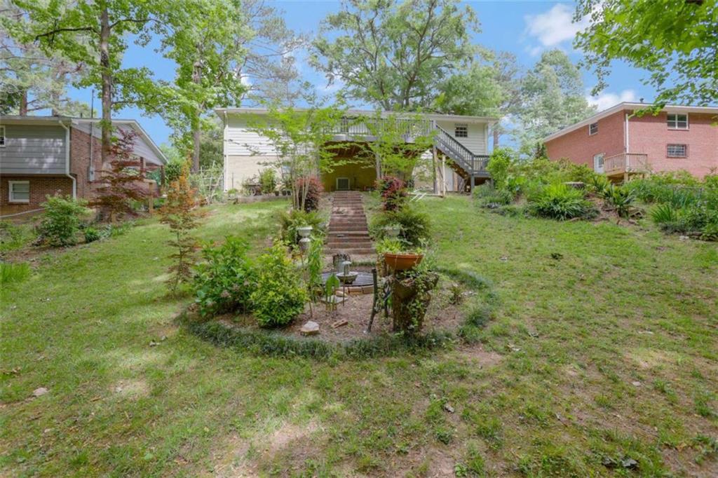 3211 Flamingo Drive East Point, GA 30344 - Photo 23 of 24 a view of a garden with pathway