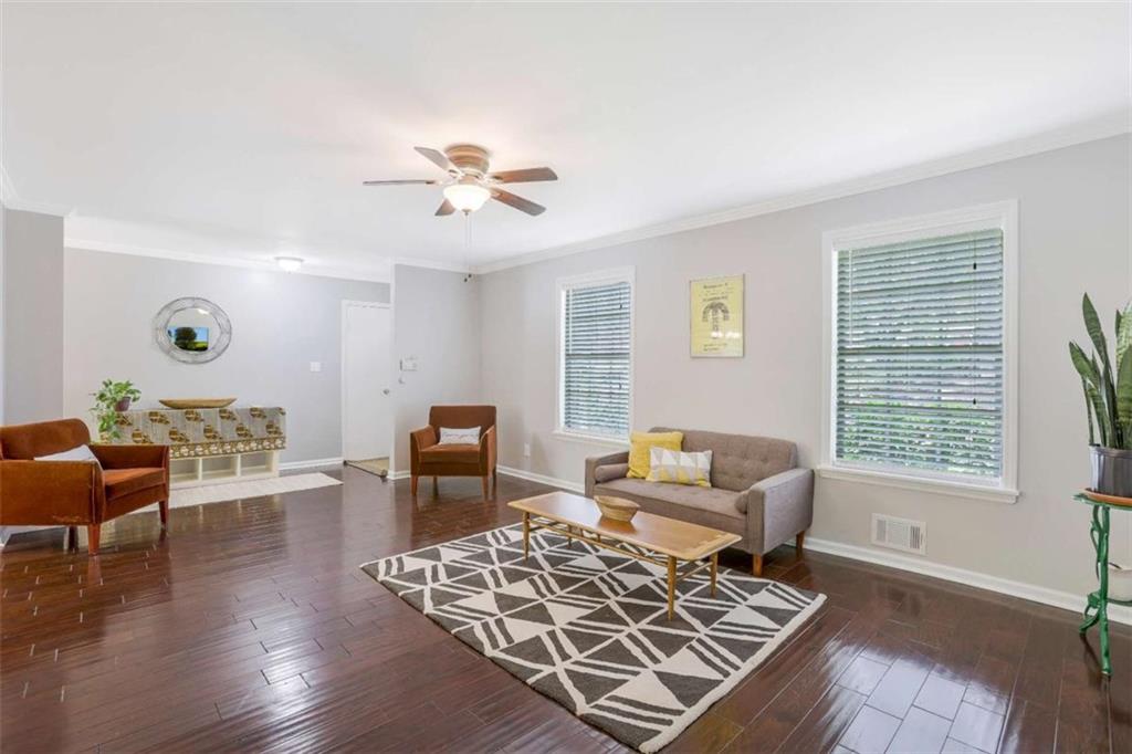 3211 Flamingo Drive East Point, GA 30344 - Photo 4 of 24 a living room with furniture and wooden floor