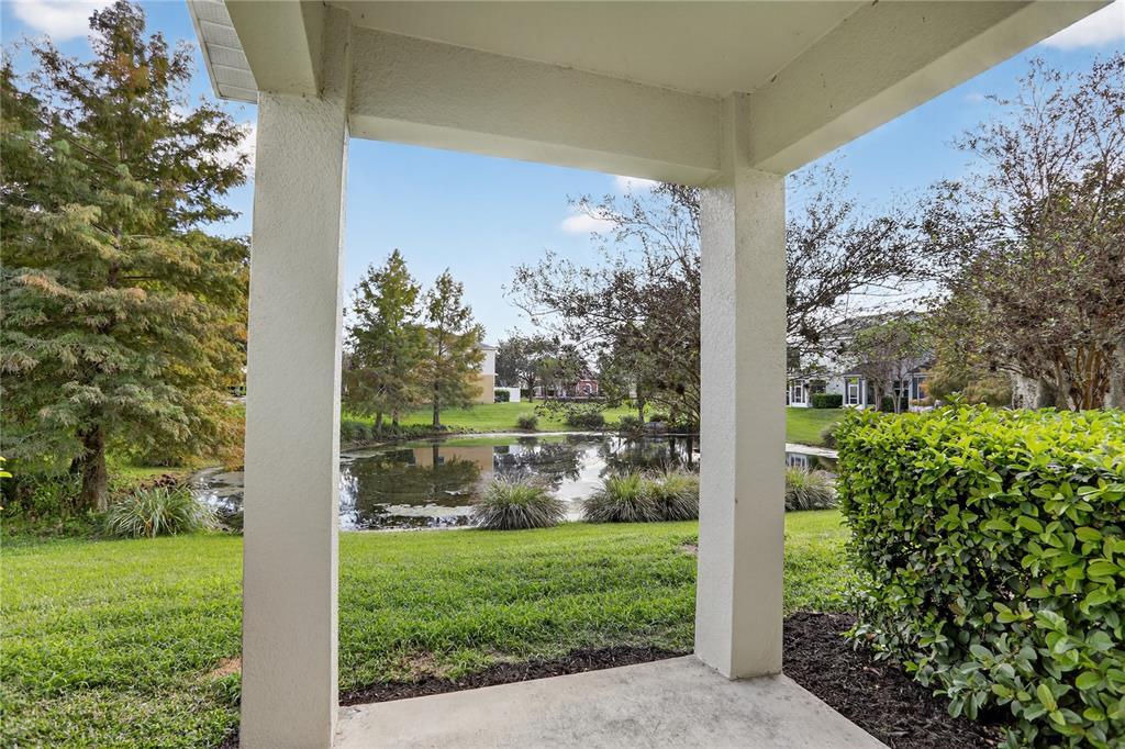 613 Fortanini Circle Ocoee, FL 34761 - Photo 20 of 24 a view of a yard with plants and a pathway
