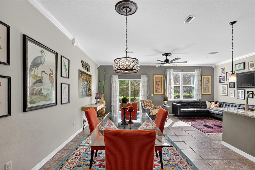 613 Fortanini Circle Ocoee, FL 34761 - Photo 9 of 24 a view of a dining room with furniture window and outside view