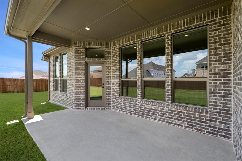 238 Harmony Avenue Forney, TX 75126 - Photo 25 of 27 DFW-Lovers Landing-Concept 2267-238 Harmony Avenue-Patio-Risewell Homes