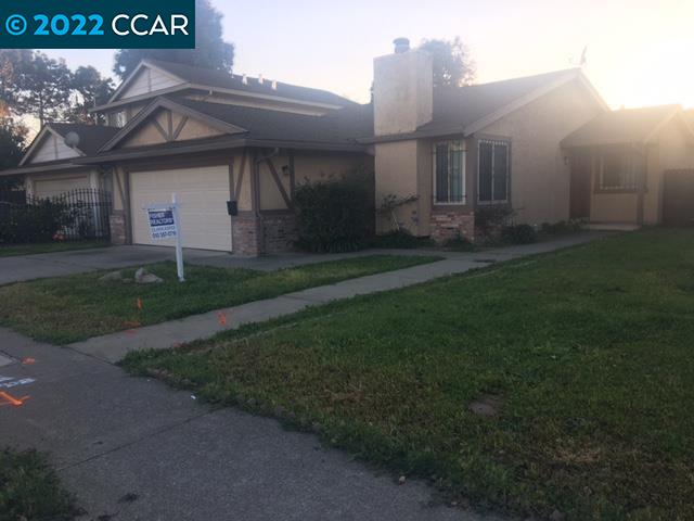 Iron Triangle Richmond, CA 94801 - Photo 1 of 1 a front view of house with yard and green space