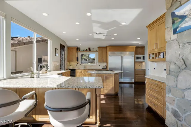 a view of a room with a large window