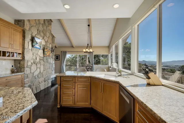 a bedroom with a bed couch and window