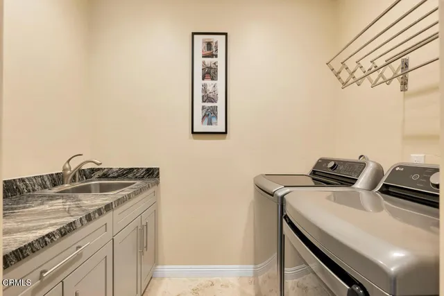 a view of a room with lots of wooden furniture