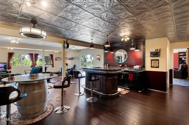 a view of a balcony with furniture