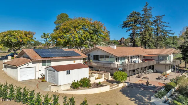 a view of balcony with potted plants