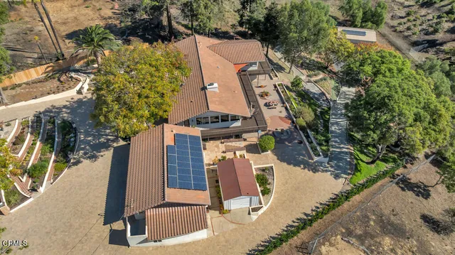 a view of a balcony with furniture