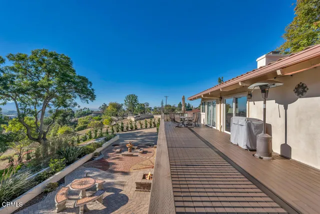 a view of a town with mountains in the background