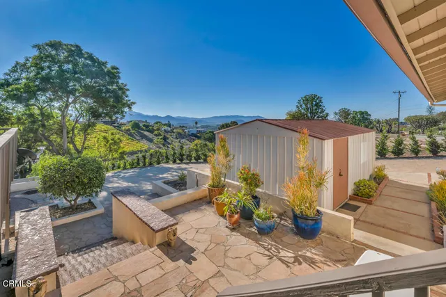 a view of parking garage with cars