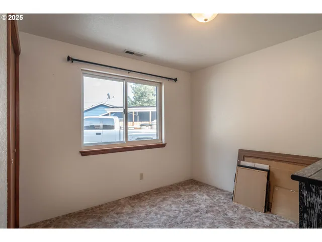 a room with furniture and a window