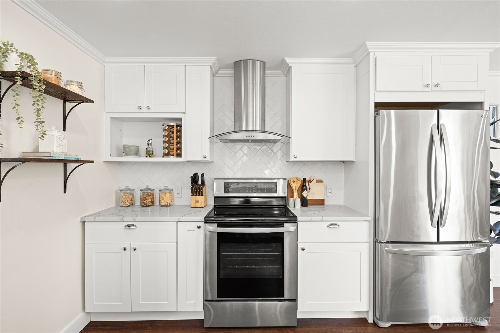 1928 Virginia Avenue Everett, WA 98201 - Photo 13 of 40 a kitchen with appliances a refrigerator and cabinets
