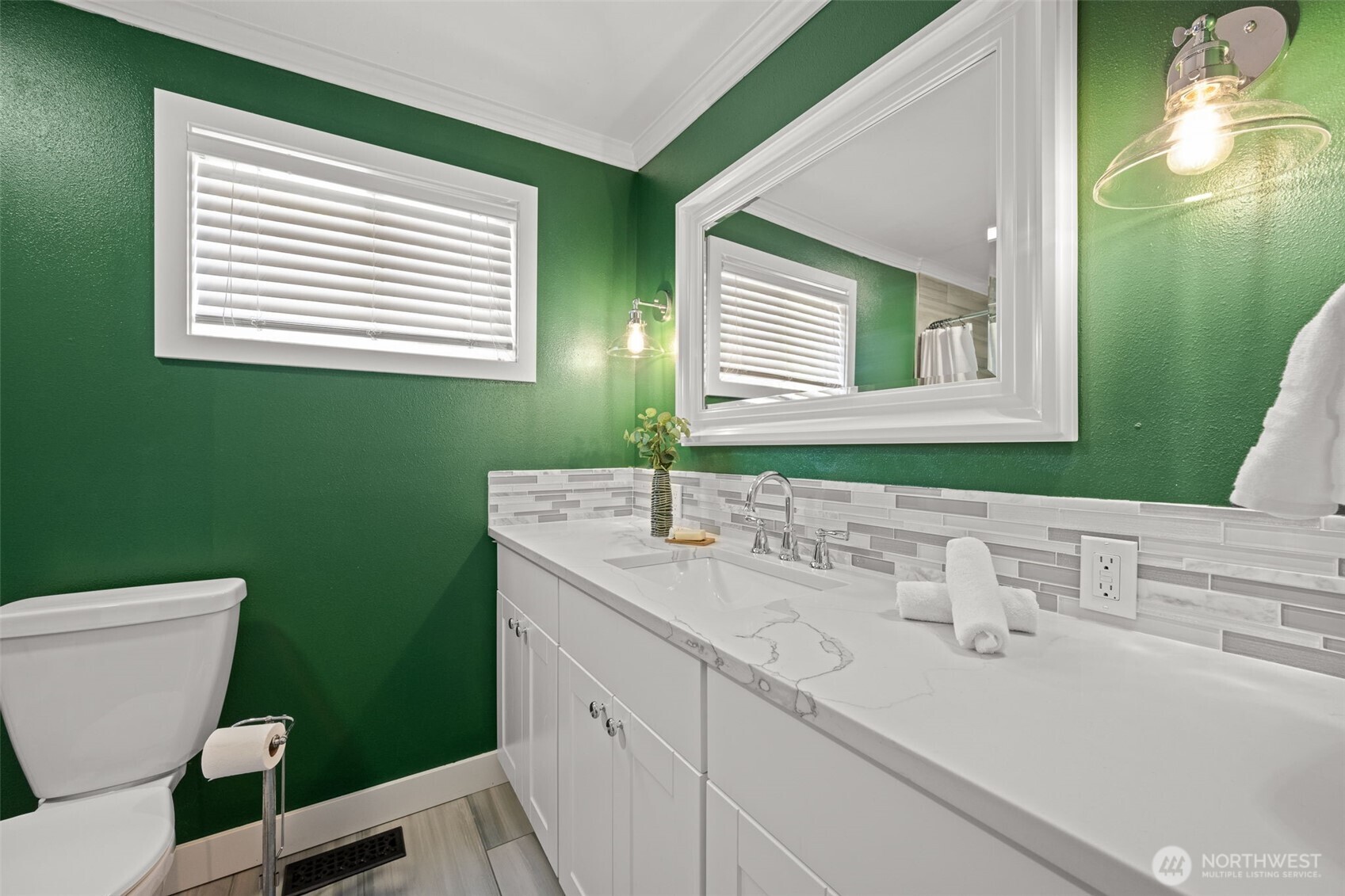 1928 Virginia Avenue Everett, WA 98201 - Photo 17 of 40 a bathroom with a sink and a mirror