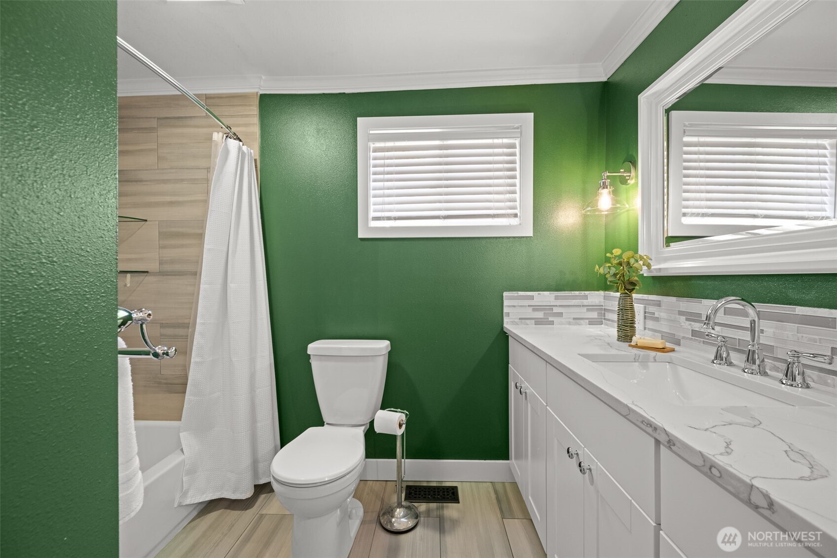 1928 Virginia Avenue Everett, WA 98201 - Photo 18 of 40 a bathroom with a granite countertop toilet sink and mirror