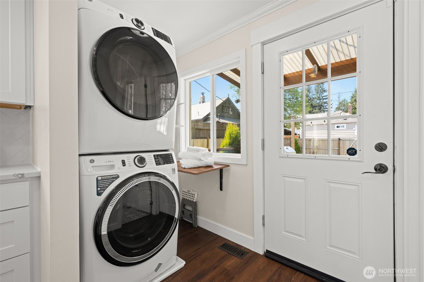 1928 Virginia Avenue Everett, WA 98201 - Photo 20 of 40 a view of a bedroom with washer and dryer