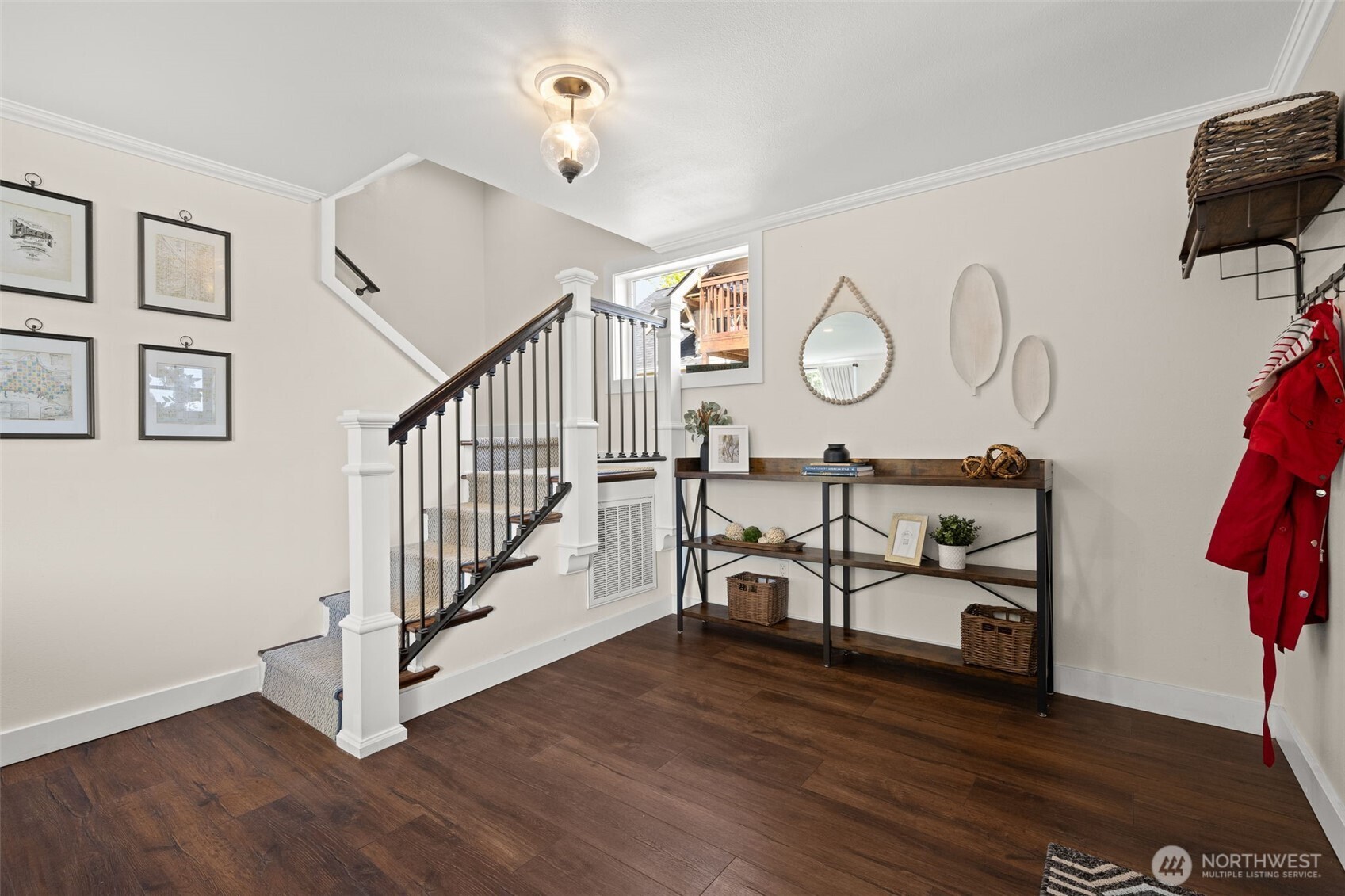 1928 Virginia Avenue Everett, WA 98201 - Photo 2 of 40 a view of a hallway with wooden floor and white walls