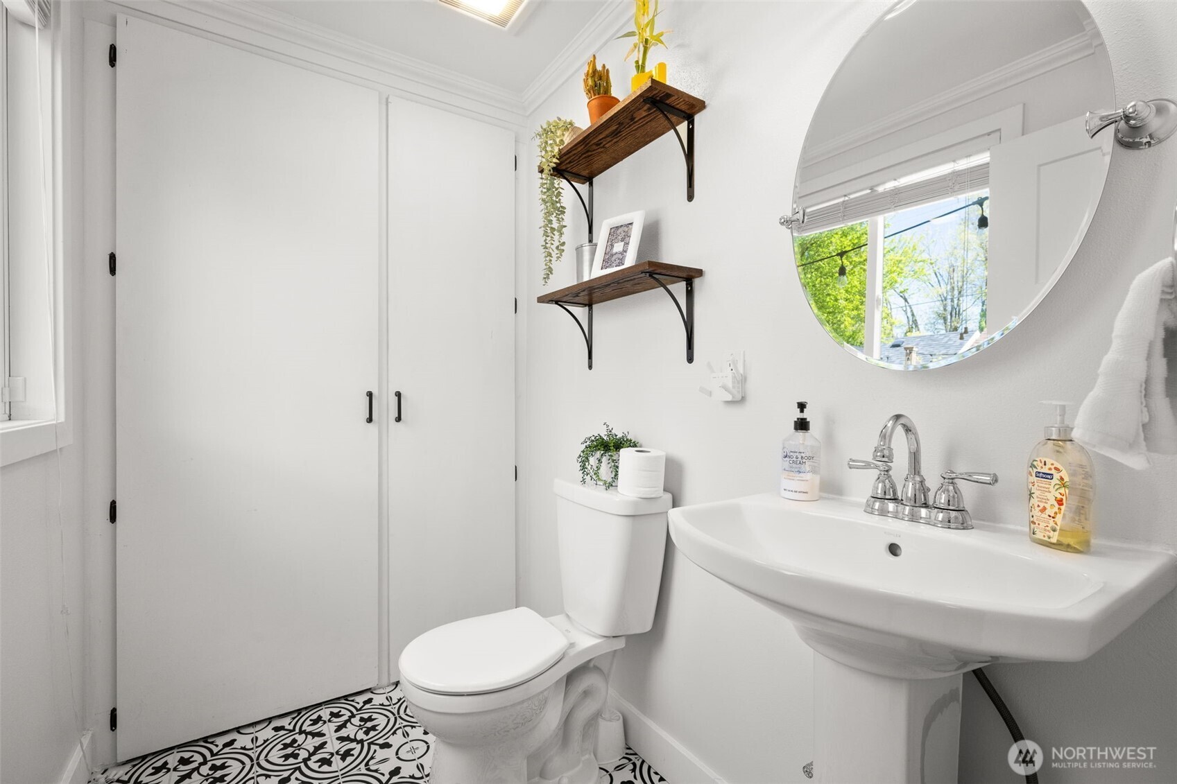 1928 Virginia Avenue Everett, WA 98201 - Photo 21 of 40 a bathroom with a sink a toilet and a mirror