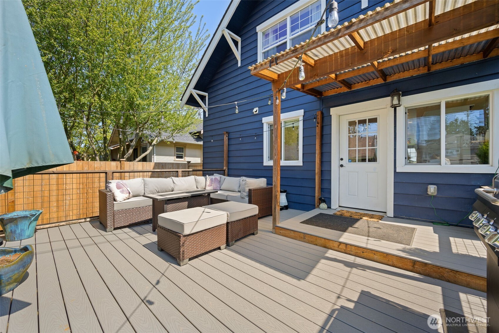 1928 Virginia Avenue Everett, WA 98201 - Photo 32 of 40 a balcony with furniture and wooden floor