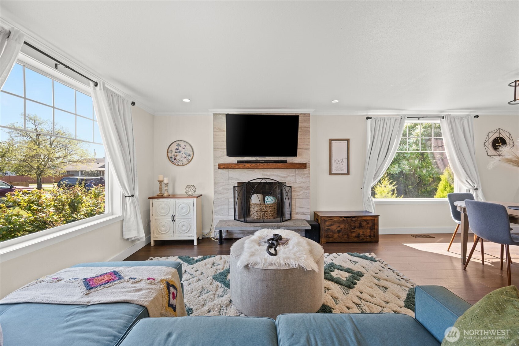 1928 Virginia Avenue Everett, WA 98201 - Photo 4 of 40 a living room with furniture a fireplace and a flat screen tv