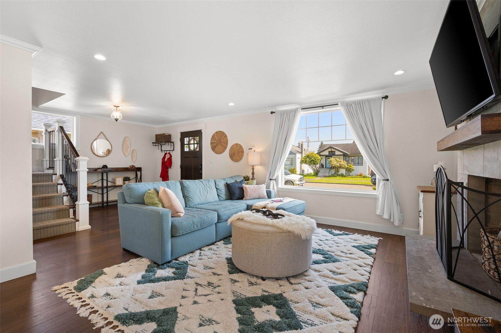 1928 Virginia Avenue Everett, WA 98201 - Photo 5 of 40 a living room with furniture a flat screen tv and a window