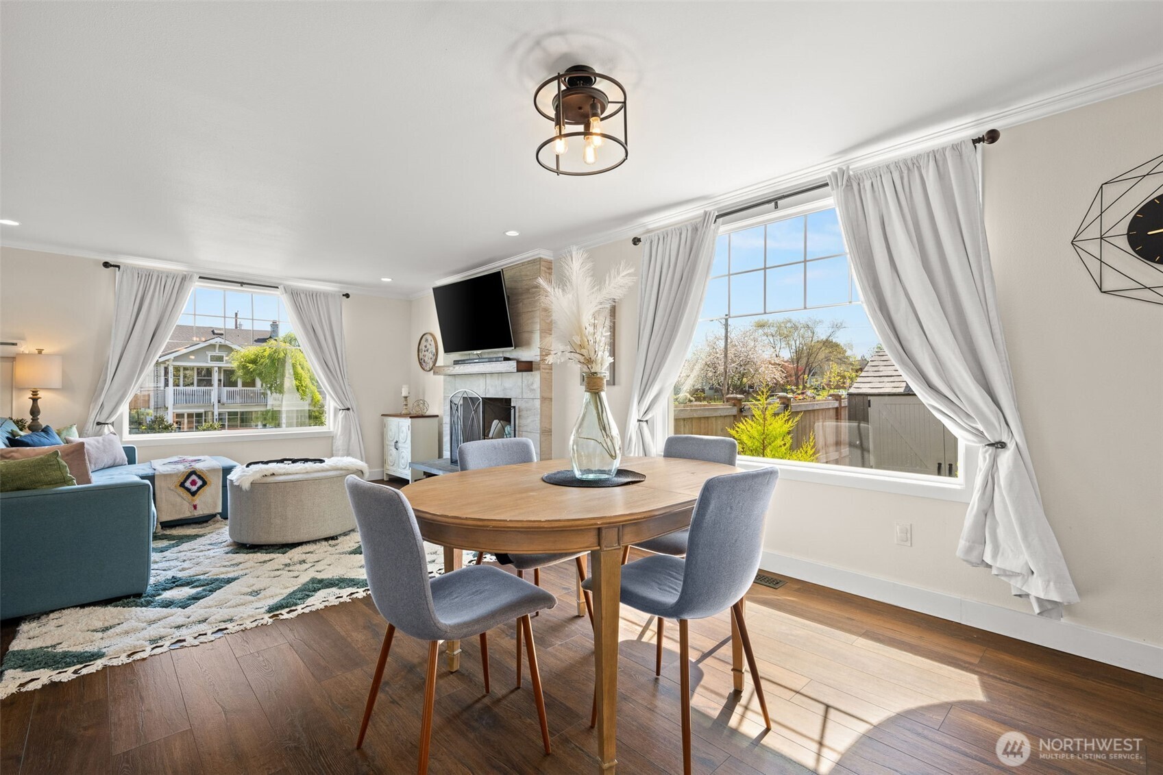 1928 Virginia Avenue Everett, WA 98201 - Photo 8 of 40 a dining room with furniture a window and a chandelier