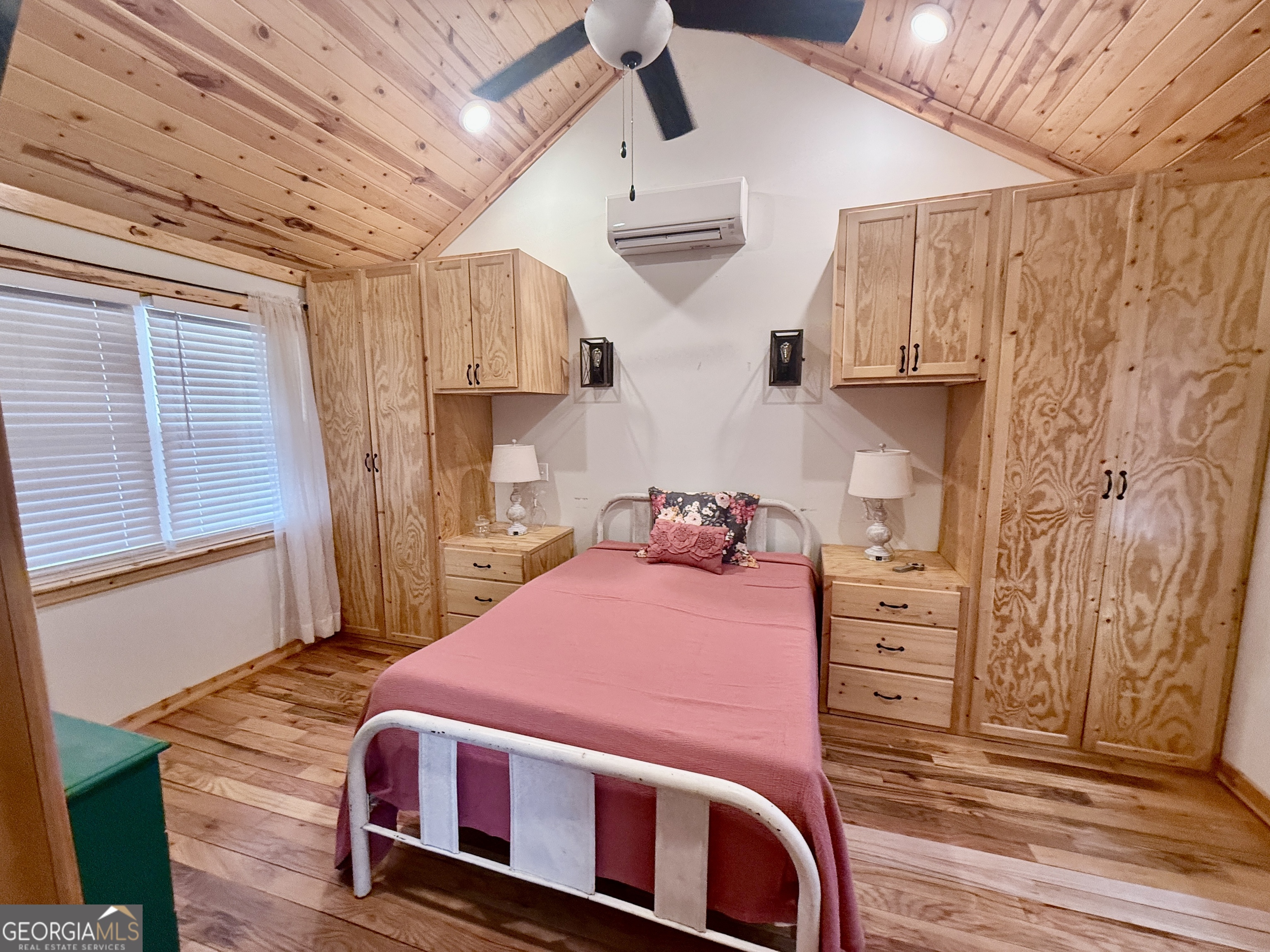 168 Ellenburg Subdivision Summerville, GA 30747 - Photo 14 of 24 a bedroom with a bed and wooden floor