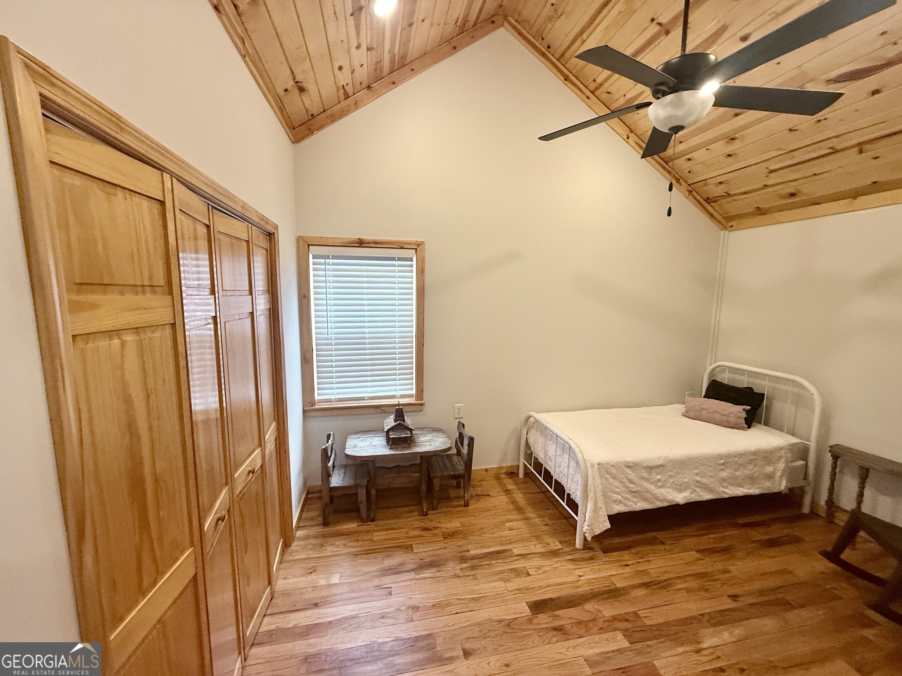 168 Ellenburg Subdivision Summerville, GA 30747 - Photo 15 of 24 a bedroom with a bed and wooden floor