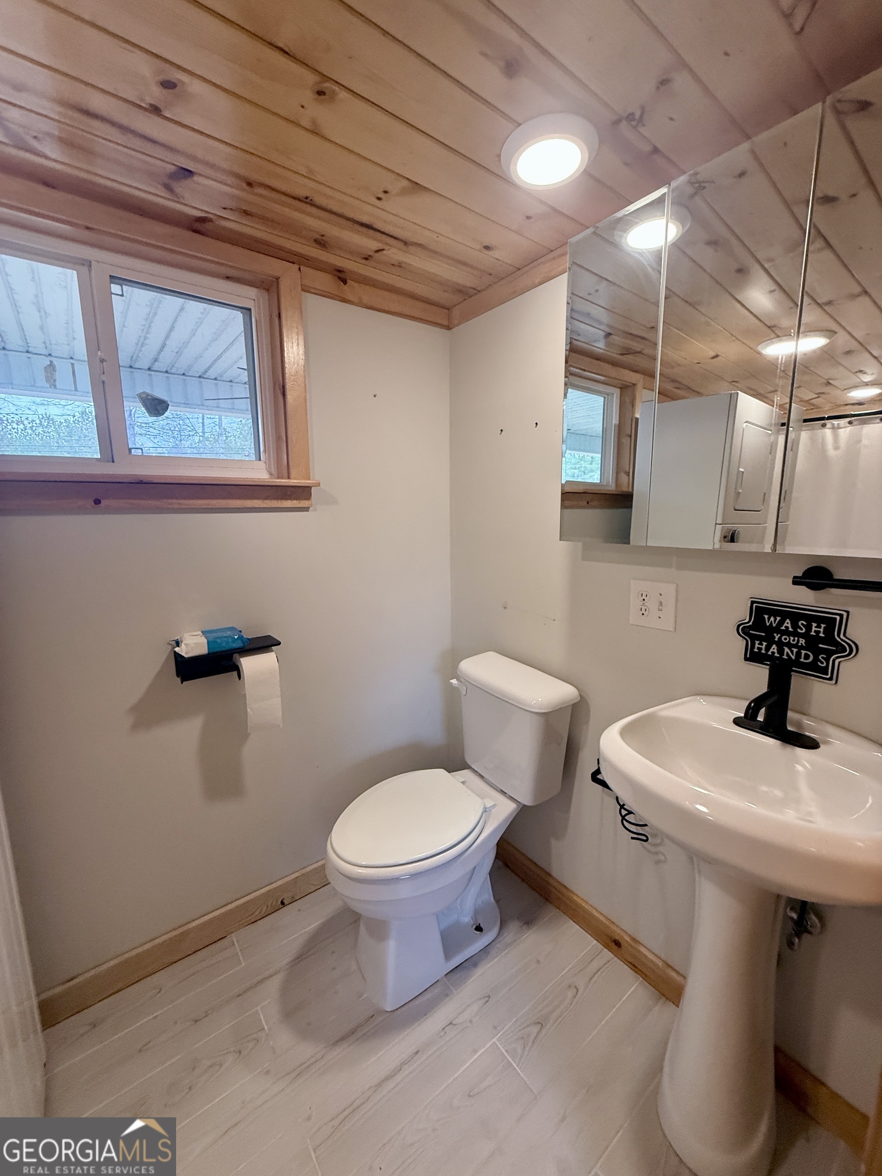 168 Ellenburg Subdivision Summerville, GA 30747 - Photo 16 of 24 a bathroom with a sink toilet and mirror