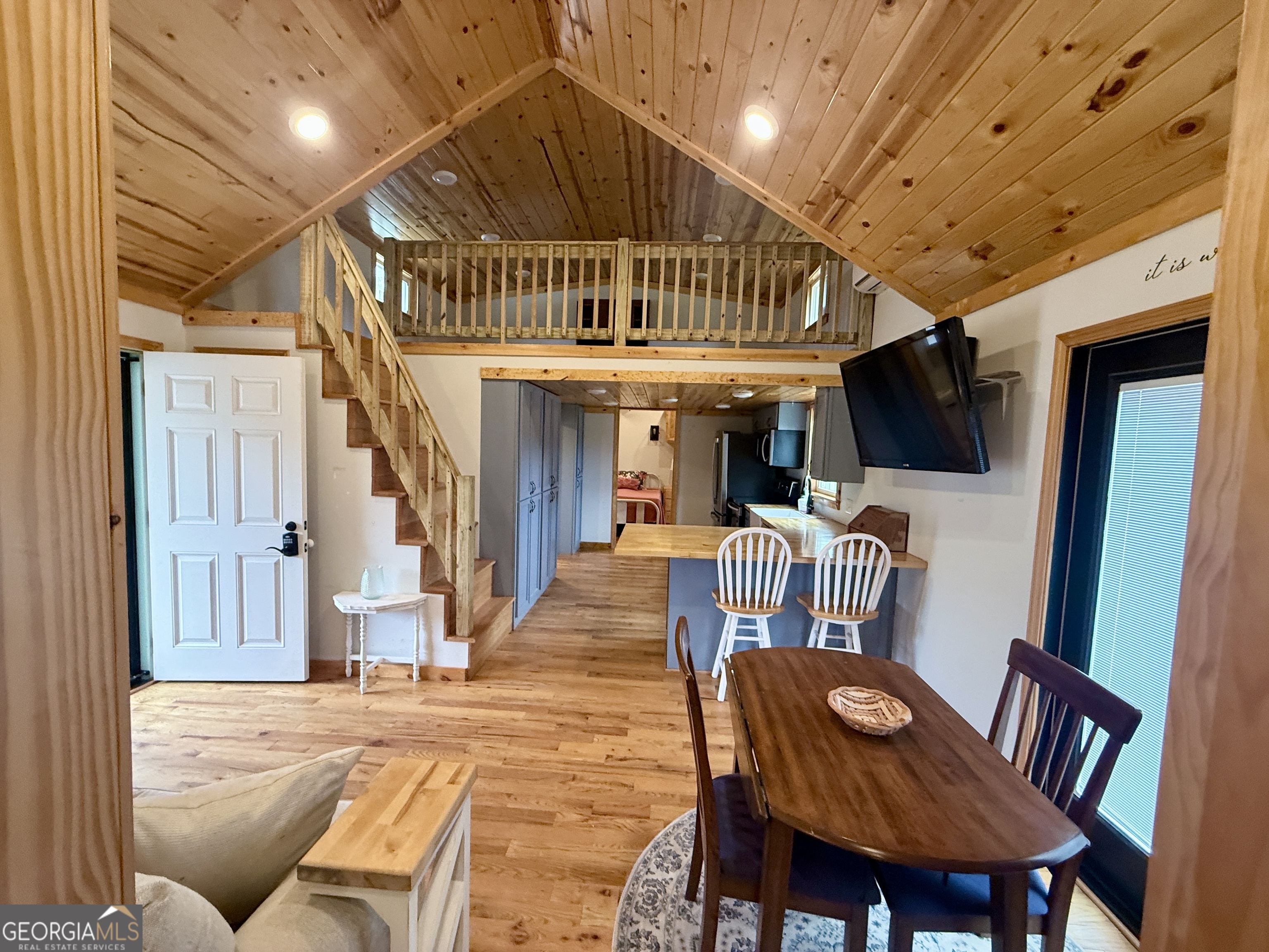 168 Ellenburg Subdivision Summerville, GA 30747 - Photo 5 of 24 a view of a livingroom with furniture a livingroom wooden floor and a rug