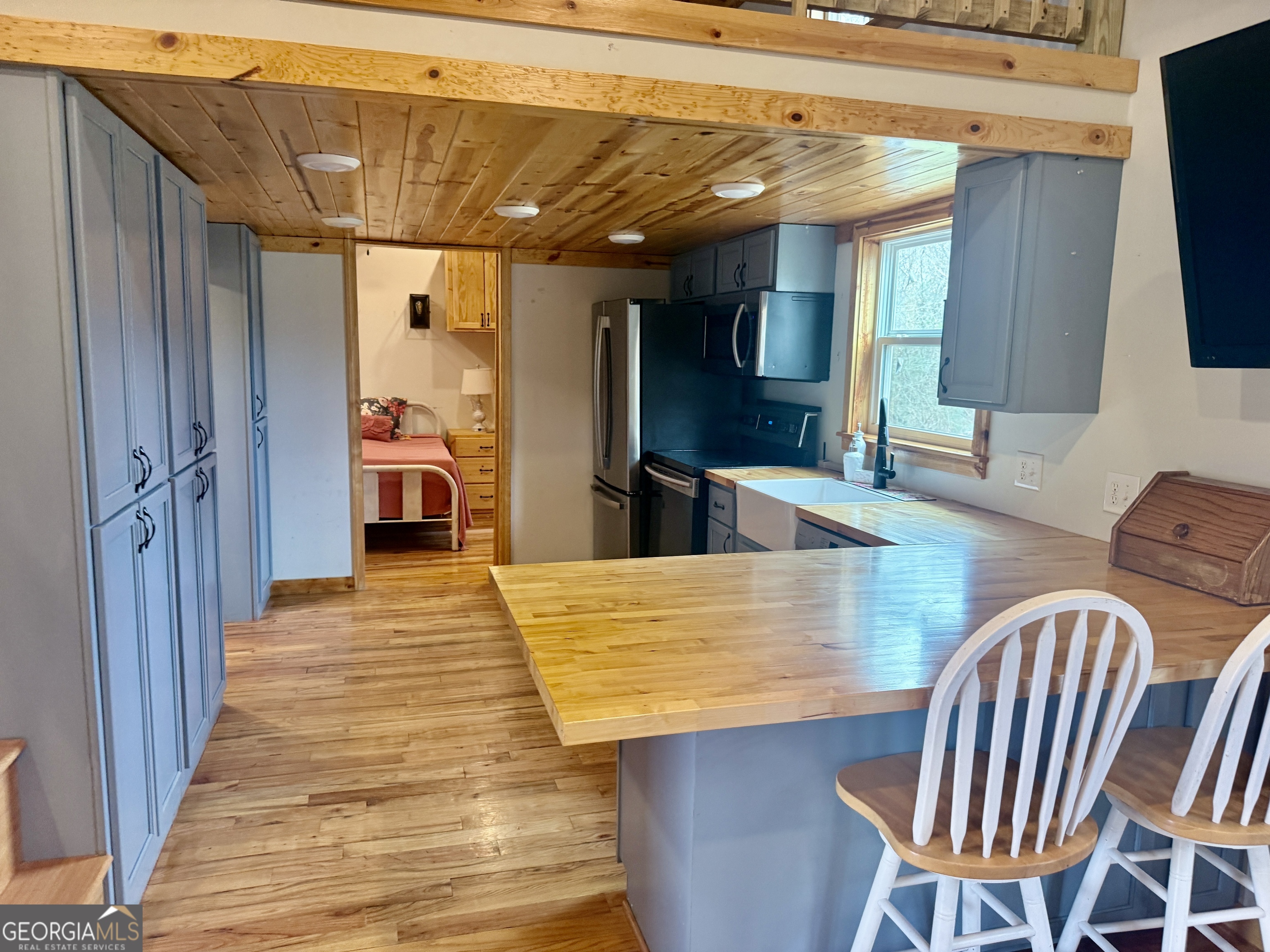 168 Ellenburg Subdivision Summerville, GA 30747 - Photo 10 of 24 a view of kitchen and dining room with wooden floor