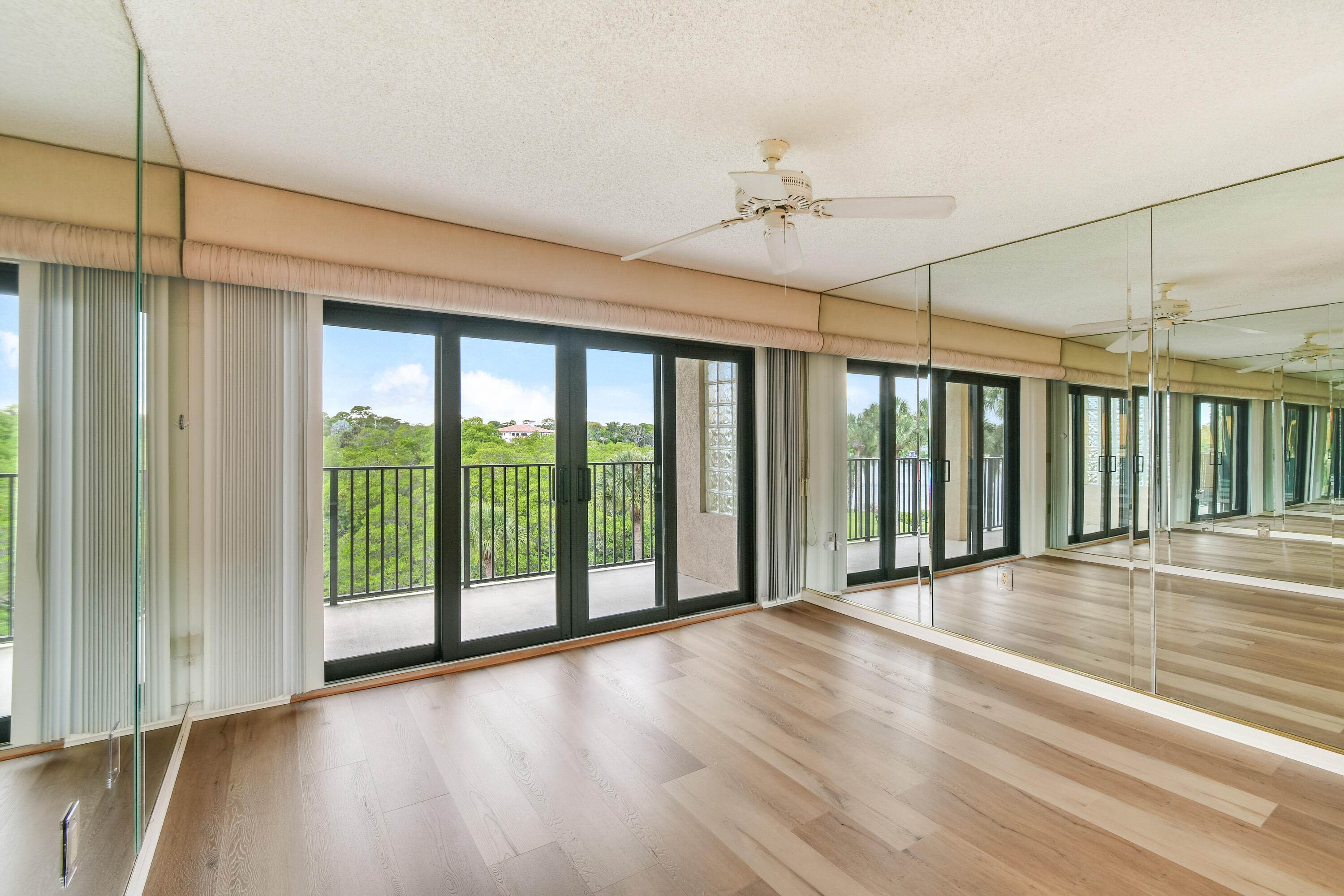 1701 Marina Isle Way, Unit 301 Jupiter, FL 33477 - Photo 18 of 60 a view of room with balcony and furniture