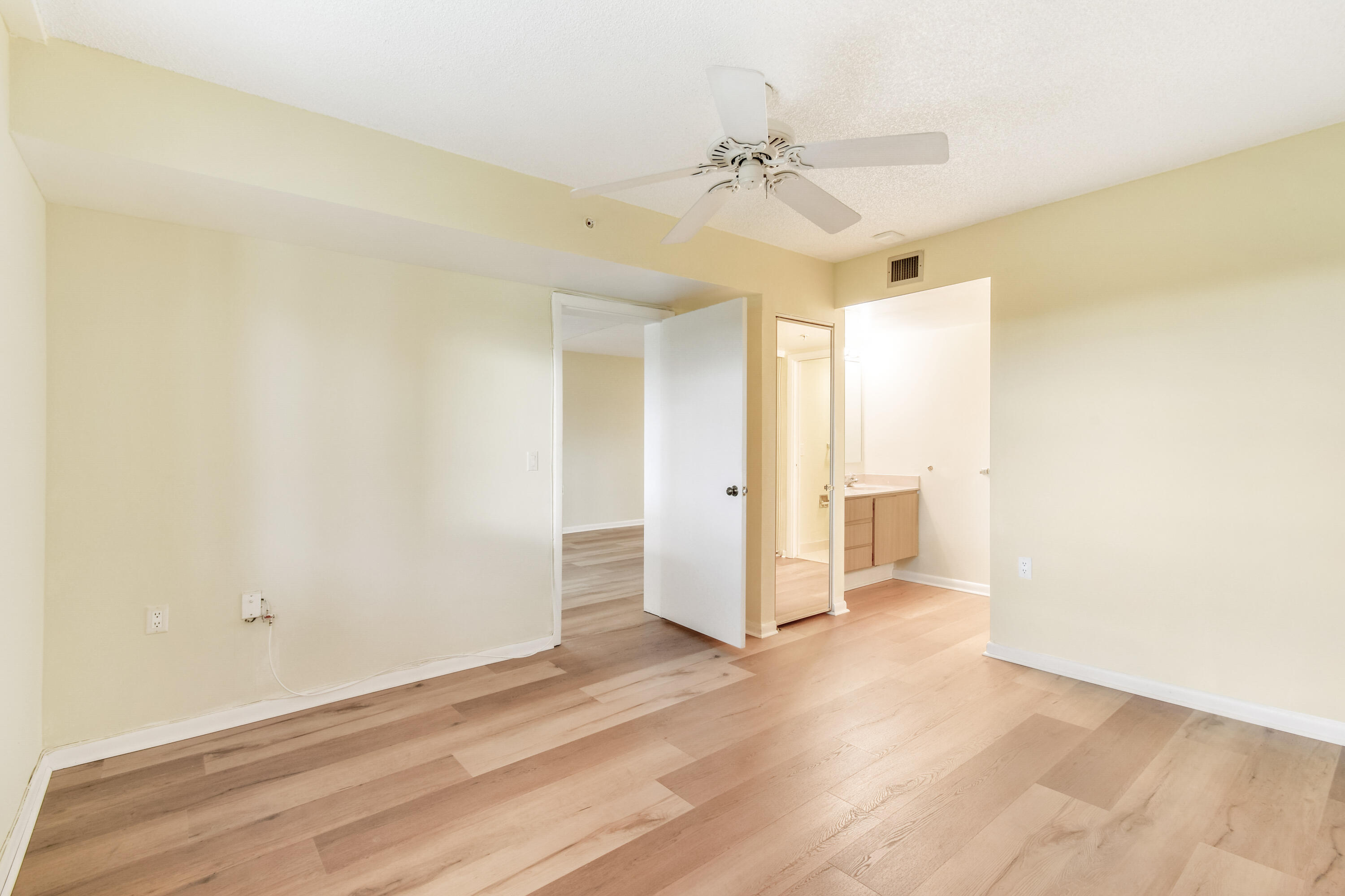 1701 Marina Isle Way, Unit 301 Jupiter, FL 33477 - Photo 24 of 60 a view of a room with wooden floor