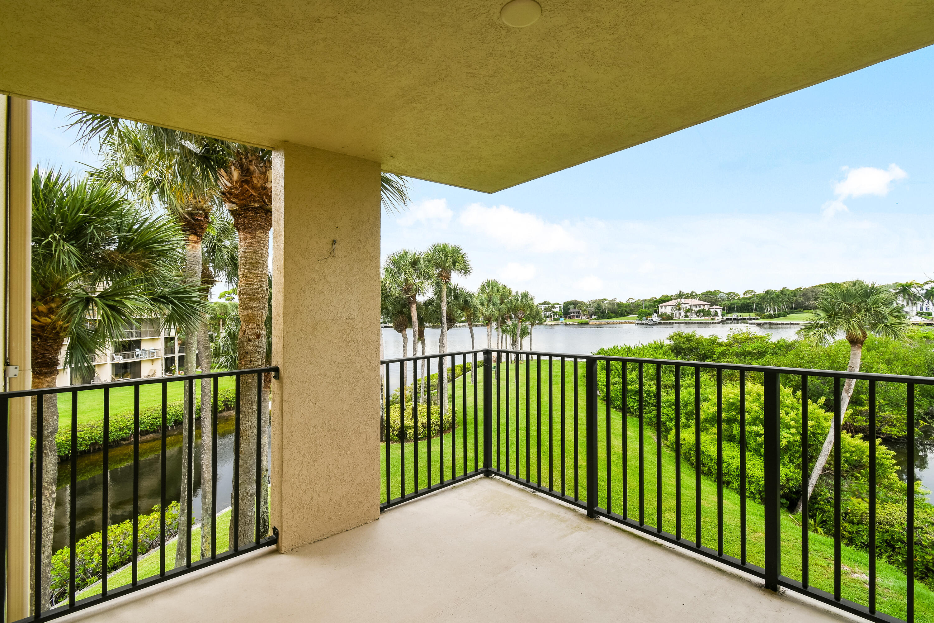 1701 Marina Isle Way, Unit 301 Jupiter, FL 33477 - Photo 4 of 60 a balcony with street view