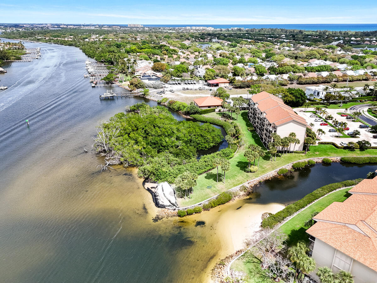 1701 Marina Isle Way, Unit 301 Jupiter, FL 33477 - Photo 50 of 60 an aerial view of residential houses with outdoor space