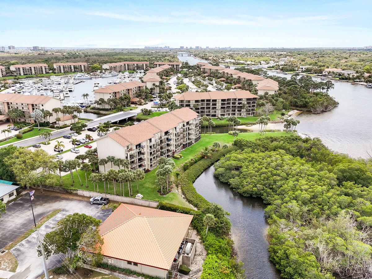 1701 Marina Isle Way, Unit 301 Jupiter, FL 33477 - Photo 52 of 60 an aerial view of residential houses with outdoor space