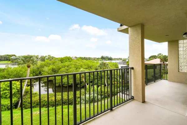 a view of a balcony with city view