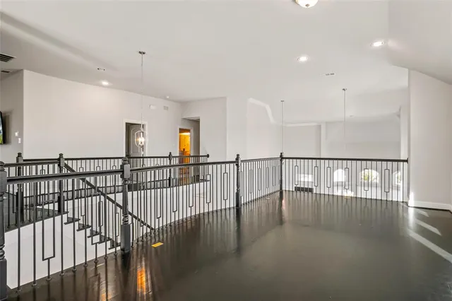 a view of staircase with lots of white walls